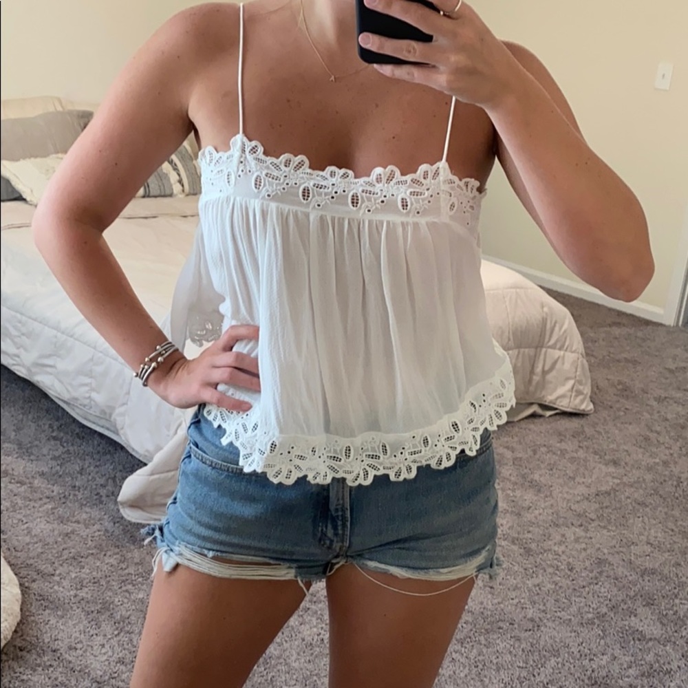 White thank top with knit detail